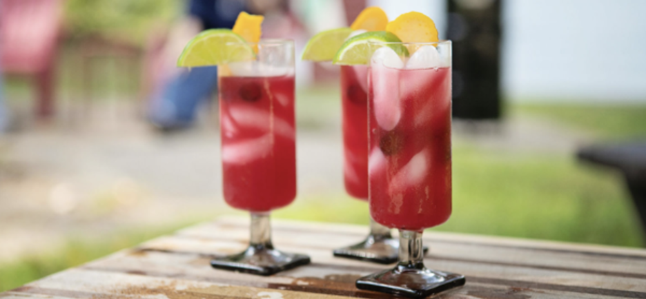 red dress cocktail drink Happy International Women's Day! Raise a glass to women in spirits. Celebrate trailblazing women distillers and winemakers with our limited-edition cocktail menu, featuring drinks inspired by the remarkable women we admire. We're