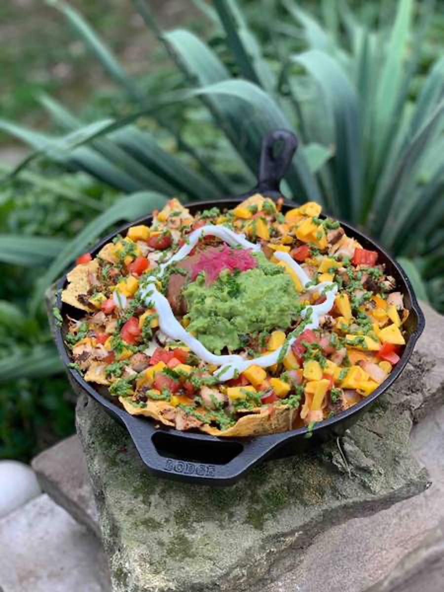 Smoked Loaded Cilantro Lime Chicken Nachos with Mango Salsa and Guacamole in Cast Iron