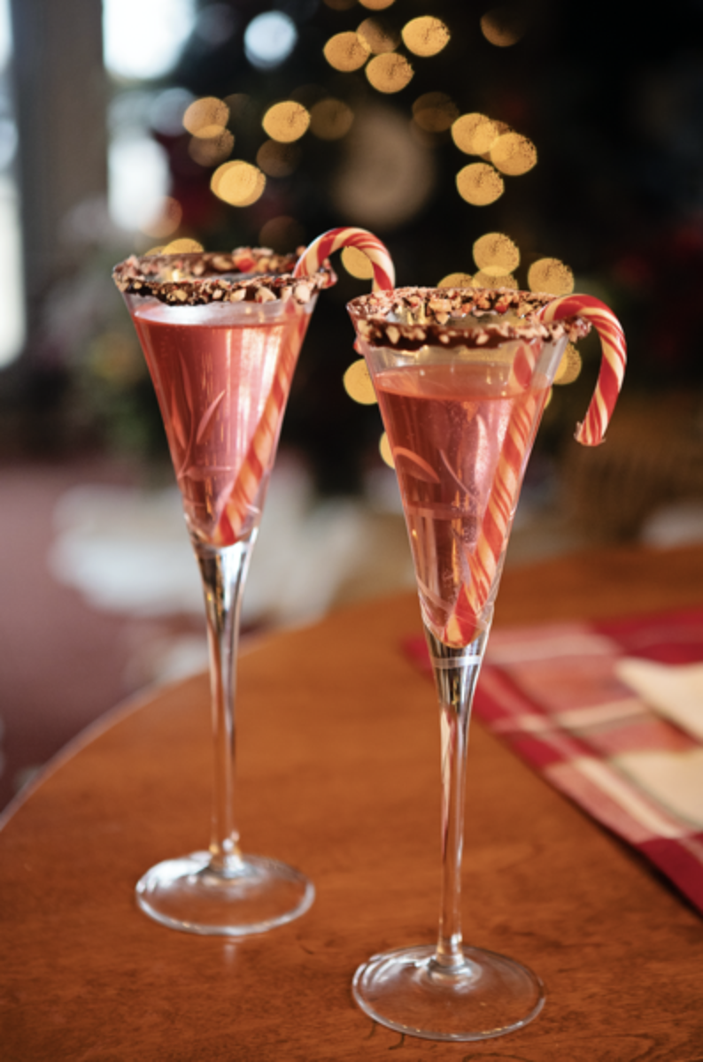 Cranberry Mimosa with Dangled Candy Cane and Chocolate Rim