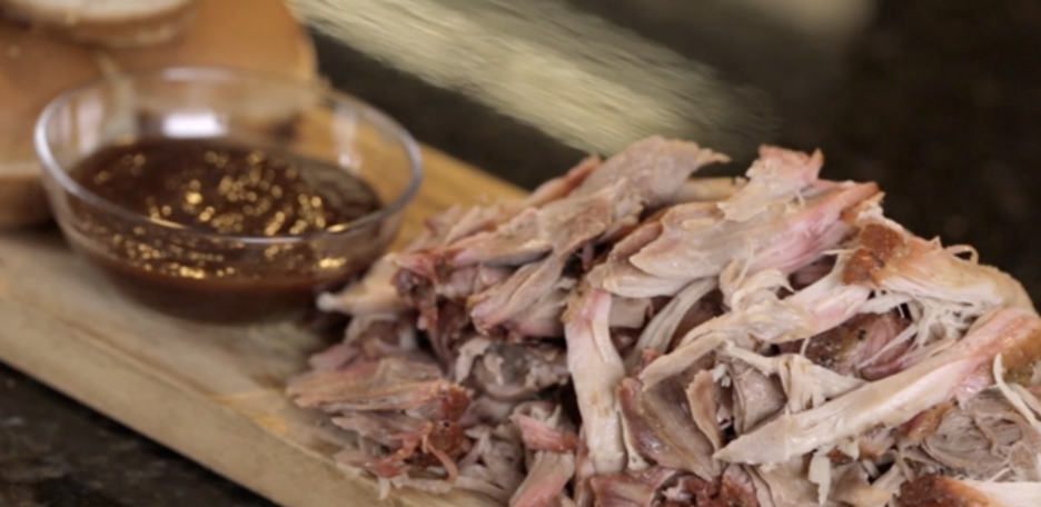 Mountain of Pulled Pork Served with Side of Barbecue Sauce