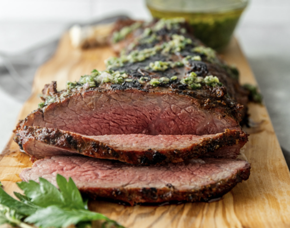 Pit Barrel Cooker Close Up Smoked Tri-tip with Jalapeño Chimichurri